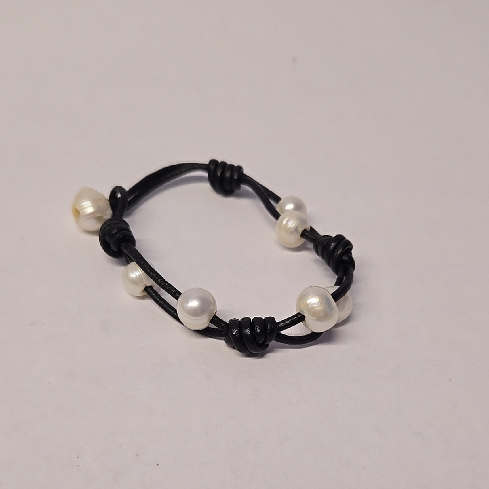 Pearl and black leather cord bracelet
